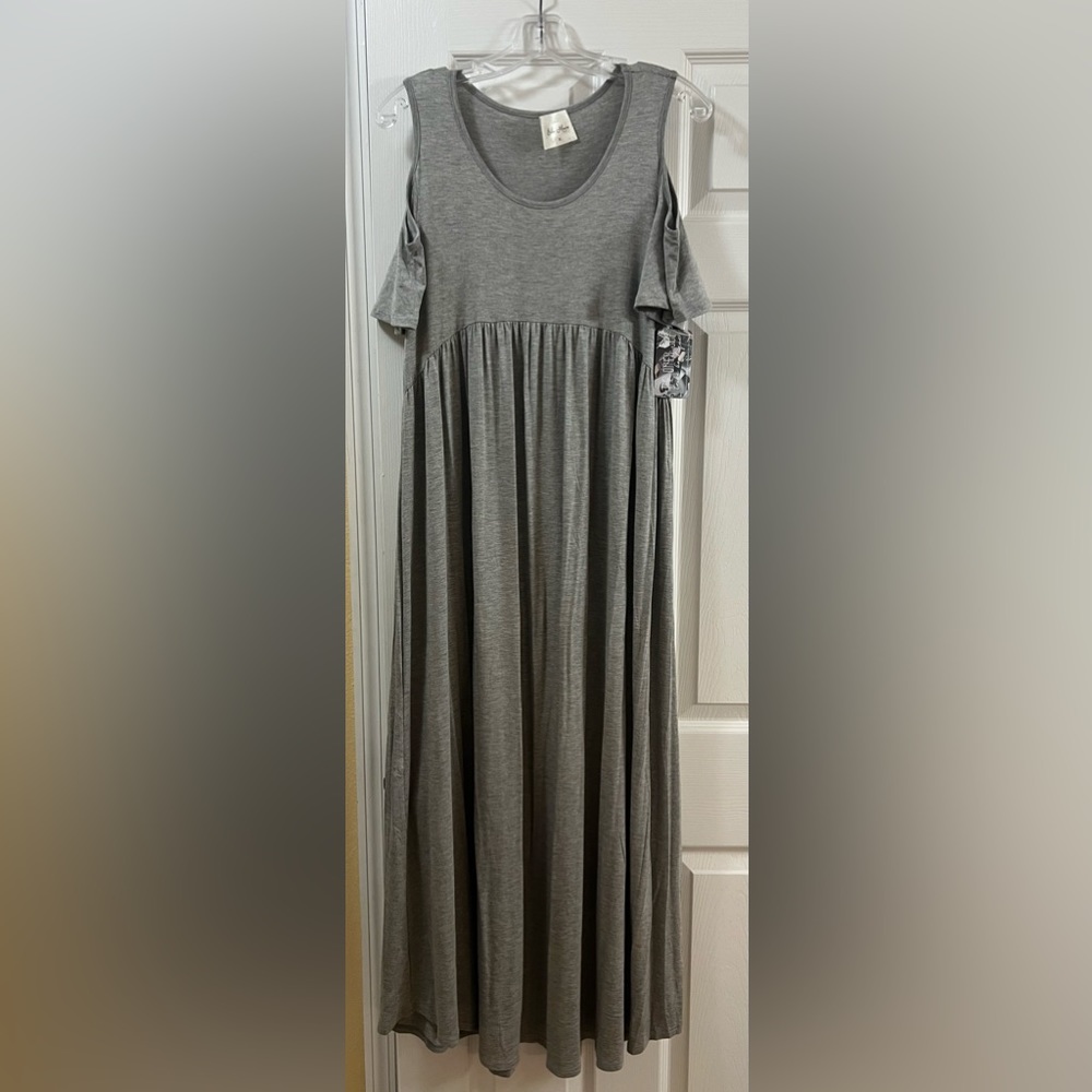Gray maxi dress with cold shoulder sleeves.